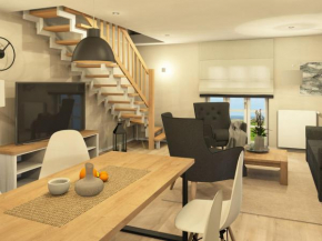 Feriendorf Rugana - Komfortplus Appartement an der Feldkante mit 2 Schlafzimmern und Terrasse D17
